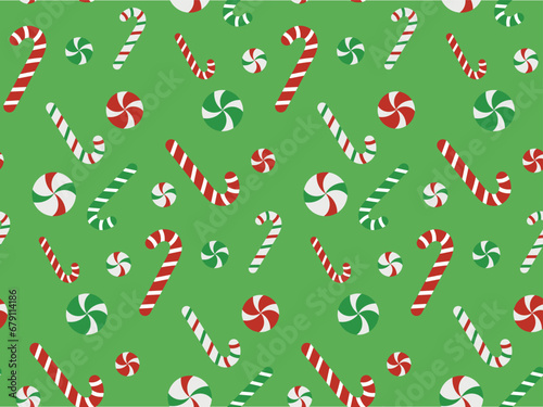 Seamless pattern with lollipop stick, red stripes on a green background. Vector illustration of candy canes