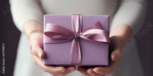 Pink gift box with a purple bow made of satin on soft beige background, Light purple Gift box with pink satin ribbon and bow on violet background Generative AI