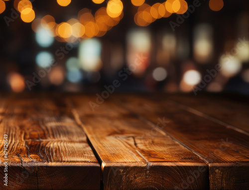 Christmas background. Empty wooden table on the background of the New Year's golden bokeh. Ready for product montage. © syhin_stas