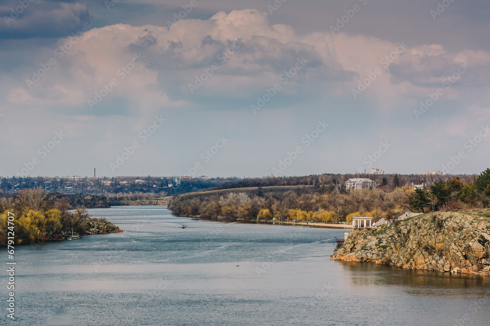 Picturesque view of the Dnieper River, Iron Bridge, Khortytsia Island by autumn - Zaporizhia, Ukraine.