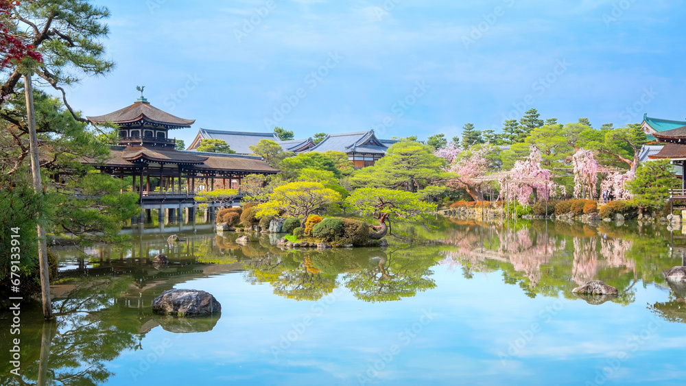 Kyoto, Japan - April 2 2023: Heian Jingu Garden is a garden with a variety of plants, ponds and buildings and weeping cherry trees, making it's one of the best cherry blossom spots in Kyoto