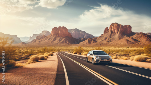 A car driving down a desert road