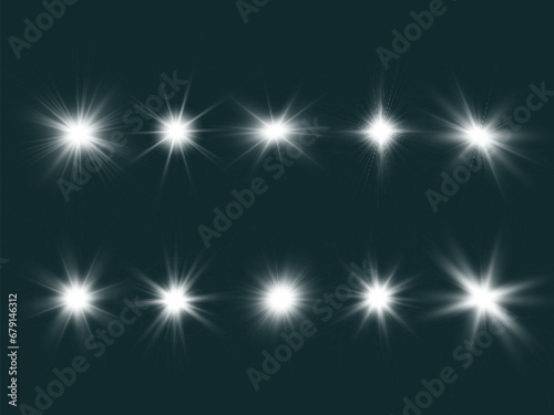 Set of bright light effects.Beautiful stars on the background. 