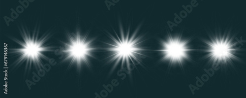 Set of bright light effects.Beautiful stars on the background.	
 photo