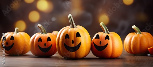 Halloween themed healthy snack for child s party with cute pumpkin banana ghosts and chocolate faces Copy space image Place for adding text or design