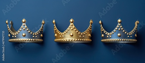 Tablou canvas January 6th celebration with three gold crowns on blue background for Dia de Rey