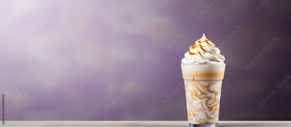 Iced taro latte topped with whipped cream Copy space image Place for adding text or design