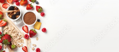 Healthy breakfast with muesli salad fruit and nuts on white background Flat lay top view Copy space image Place for adding text or design
