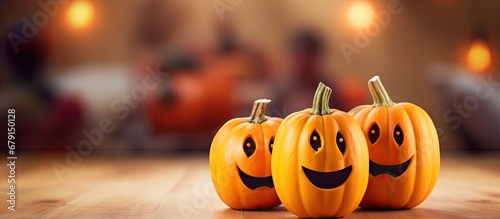 Halloween themed healthy snack for child s party with cute pumpkin banana ghosts and chocolate faces Copy space image Place for adding text or design