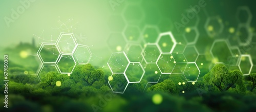 Hexagonal shape of connected icons on green background illustrating sustainable business and environmental protection Copy space image Place for adding text or design