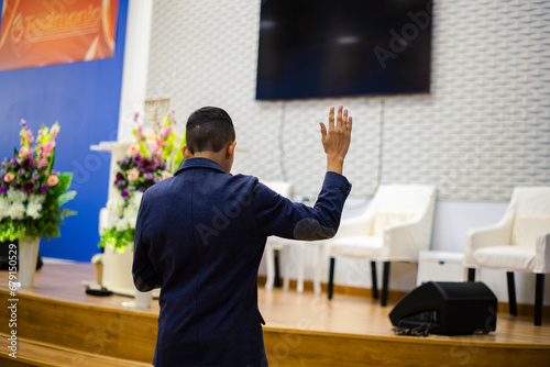 man hand up liberation church worship