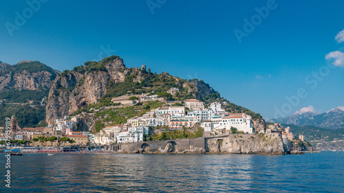 A trip to the Amalfi Coast on a summer's day, blue sky. View of the idyllic houses on the cliff. Italy.