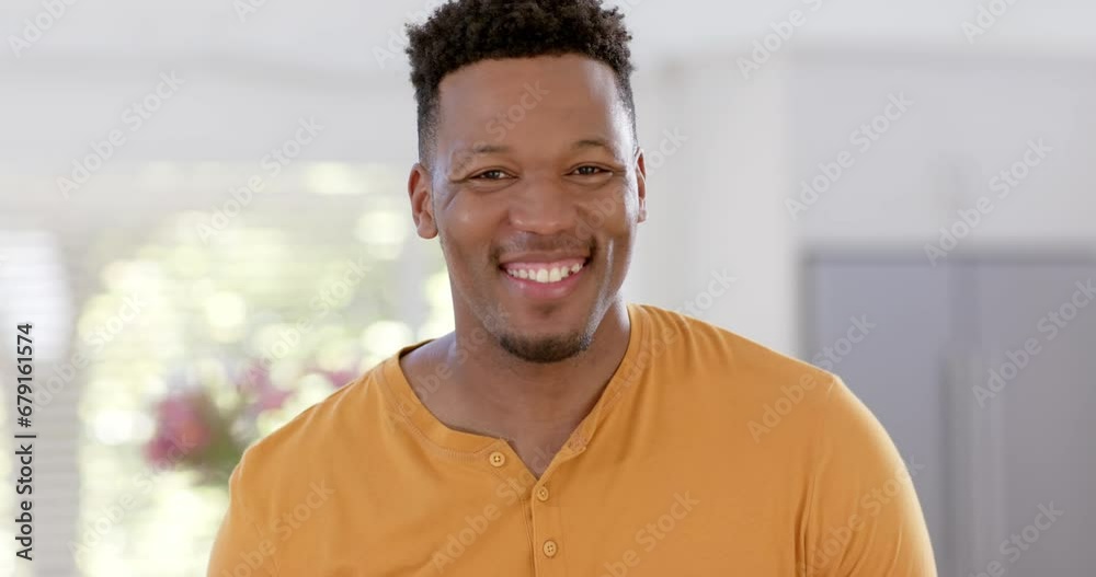 Portrait of happy african american man with short hair at home, slow motion