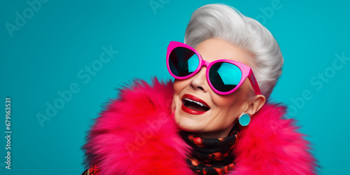 Cool and Stylish Senior Older Woman with Neon Pink and Blue Fashionable Clothes and Sunglasses