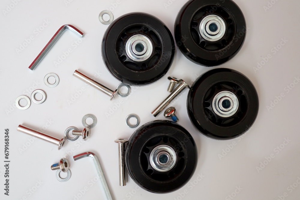Suitcase wheel spare parts. trolley wheels and bolts as well as washers and keys. replacement of damaged suitcase wheels. Suitcase wheel spare parts. trolley wheels and bolts as well as washers and keys. replacement of damaged suitcase wheels.