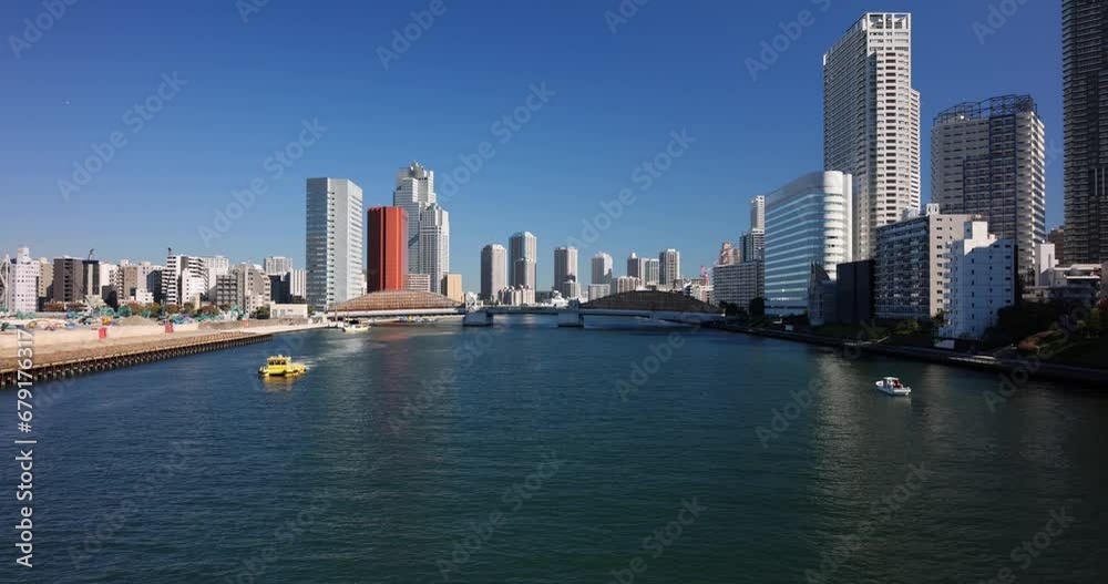 A view of the Sumida River and the Tokyo skyline. A view of the Sumida River and the Tokyo skyline.