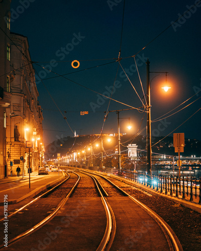 Tram tracks at night at Kossuth Lajos tér, in Budapest, Hungary photo