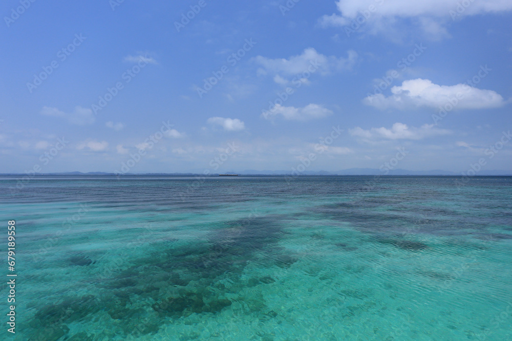 Crystal clear waters and shade of coconut trees on the Koh Talu Island Bang Saphan Noi Prachuap Khiri Khan Thailand Crystal clear waters and shade of coconut trees on the Koh Talu Island Bang Saphan Noi Prachuap Khiri Khan Thailand