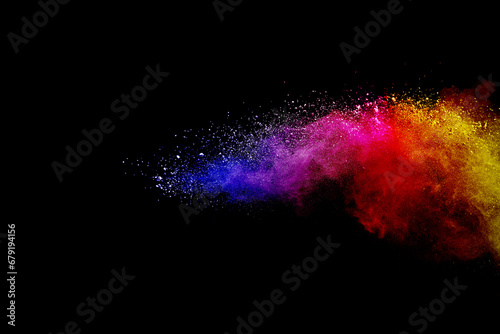 Dust motion of color powder explosive and splash isolated on black background