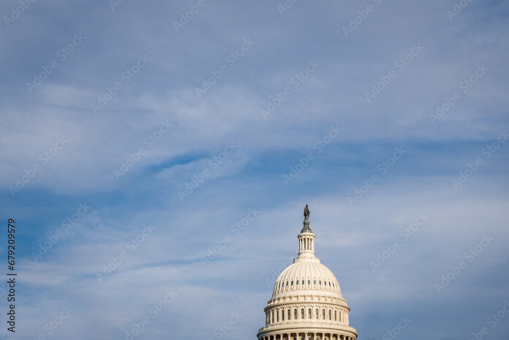 Washington, DC, United States Capitol Dome with bright blue sky in background.