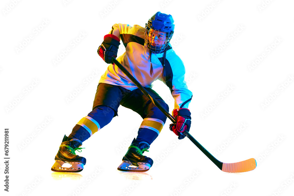 Obraz premium Young girl, hockey player in uniform and helmet training, standing with stick against white background in neon light. Concept of professional sport, competition, game, action, hobby, achievement