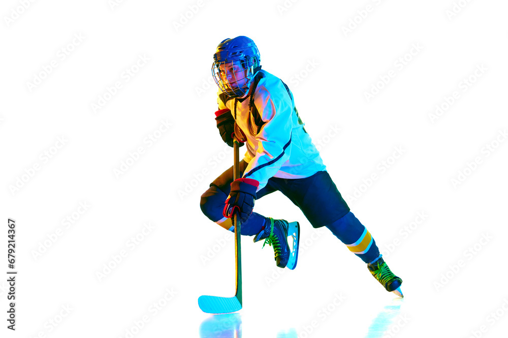 Dynamic image of young woman, hockey payer i n motion during game, training, playing against white background in neon light. Concept of professional sport, competition, game, action, hobby