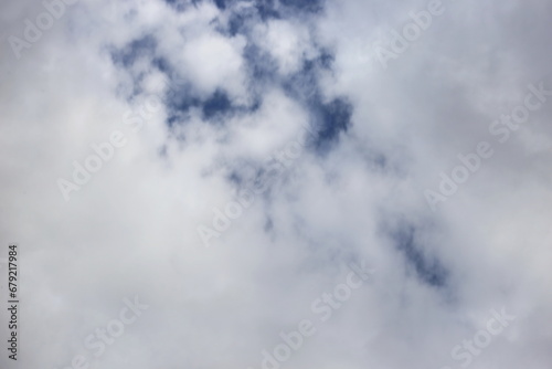 white clouds against a blue clear sky