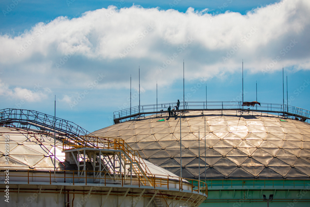 Male workers rope access height safety connecting with eight knots safety harness, clipping into roof fall arrest and fall restraint anchor point systems ready to ascending