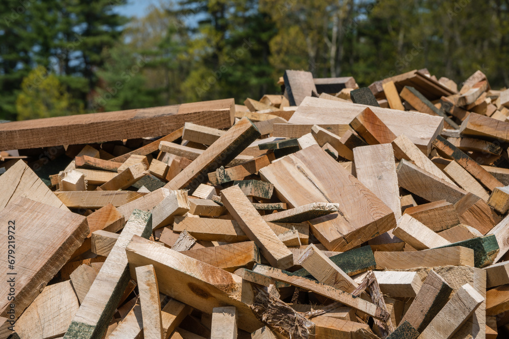 Scrap wood thrown out at a lumber yard warehouse. Scrap wood thrown out at a lumber yard warehouse.