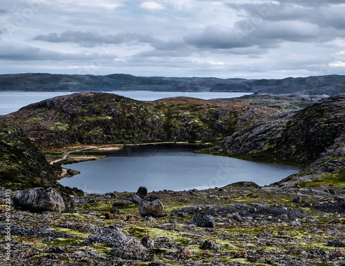 Gloomy landscape of polar tundra. Northern nature of Teriberka, Kola Peninsula