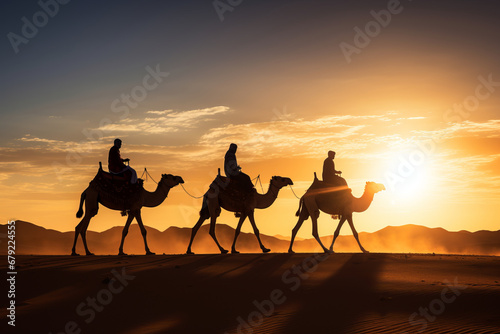 Fototapeta Silhouette of the three wise men traveling on camels to Bethlehem for the birth