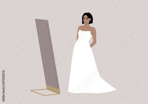 A bride stands in a fancy boutique, trying on a wedding dress while admiring herself in a grand floor mirror