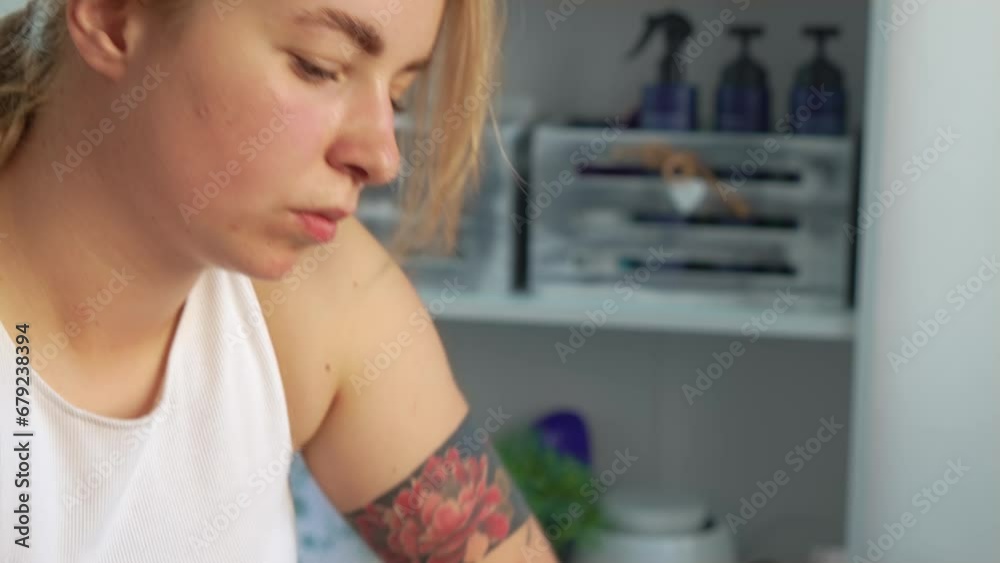 Portrait of tired masseuse massaging invisible client, working at rehabilitation clinic for problems of musculoskeletal system. Masseur touching with warm hand body of female patient for body Portrait of tired masseuse massaging invisible client, working at rehabilitation clinic for problems of musculoskeletal system. Masseur touching with warm hand body of female patient for body