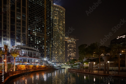 Dubai downtown buildings glow at night. Dubai, UAE - 2 February, 2020