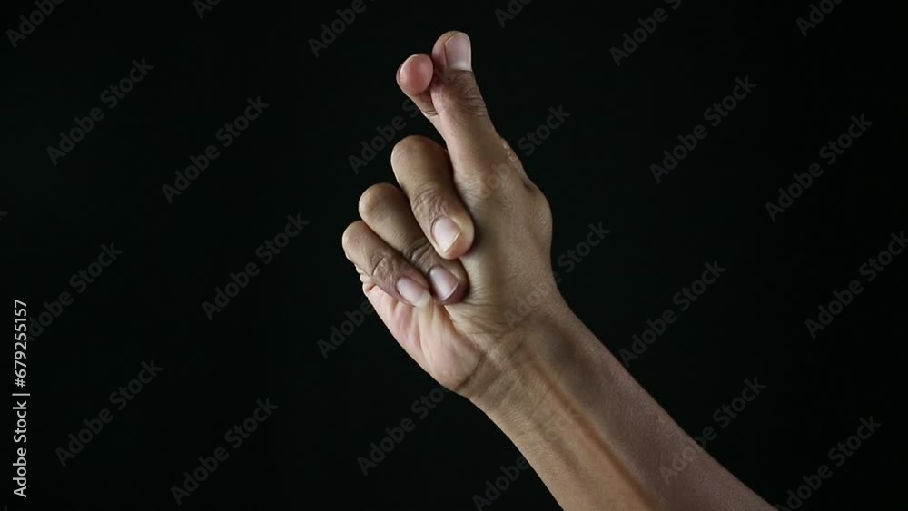 Close up of man's hand snapping her finger doing the hand gesture Close up of man's hand snapping her finger doing the hand gesture
