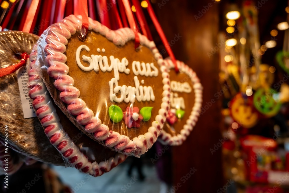 Closeup shot of heart-shaped cookies with lettering: Greetings from Berlin