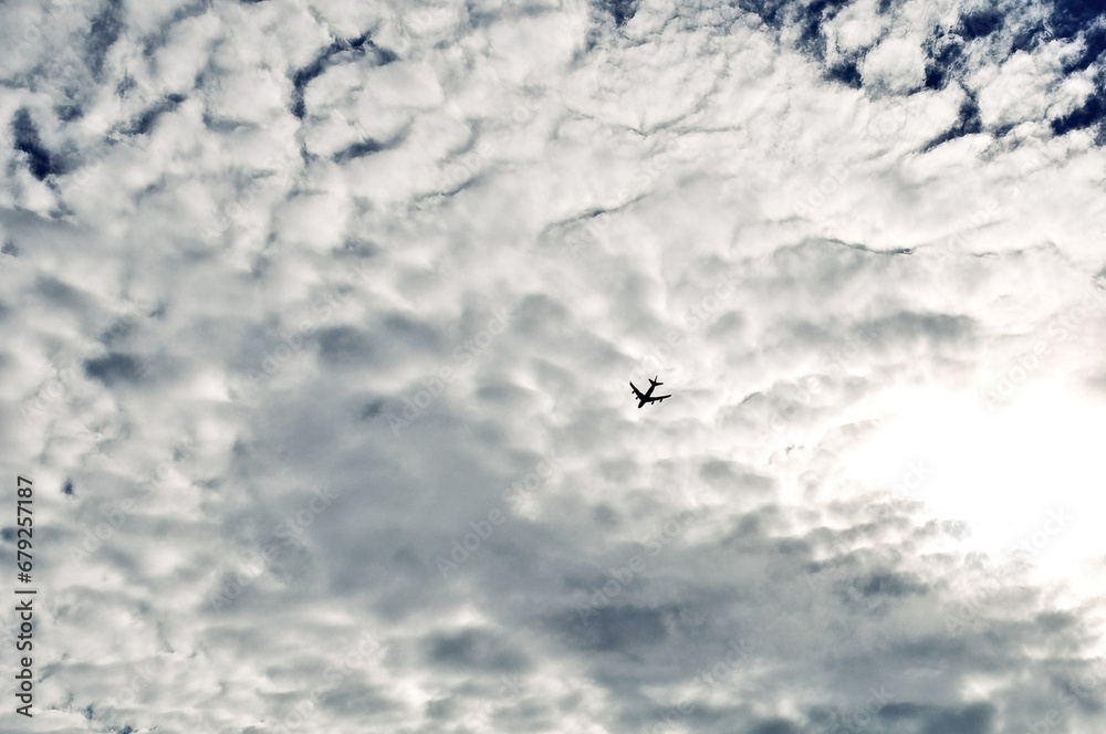 sky and clouds, with a airplane