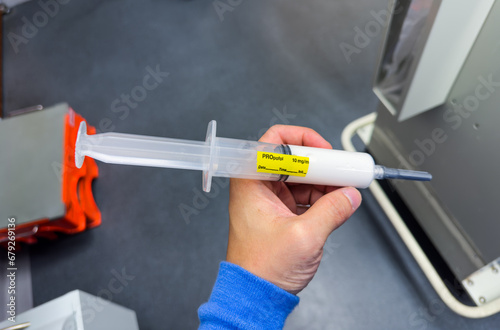 medical syringes with anesthetic drugs in hospital setting, illustrating healthcare, medication, and treatment concept photo