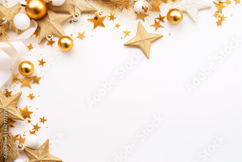 A festive postcard-ready scene of golden Christmas decorations on white background offers plenty of space for text.
