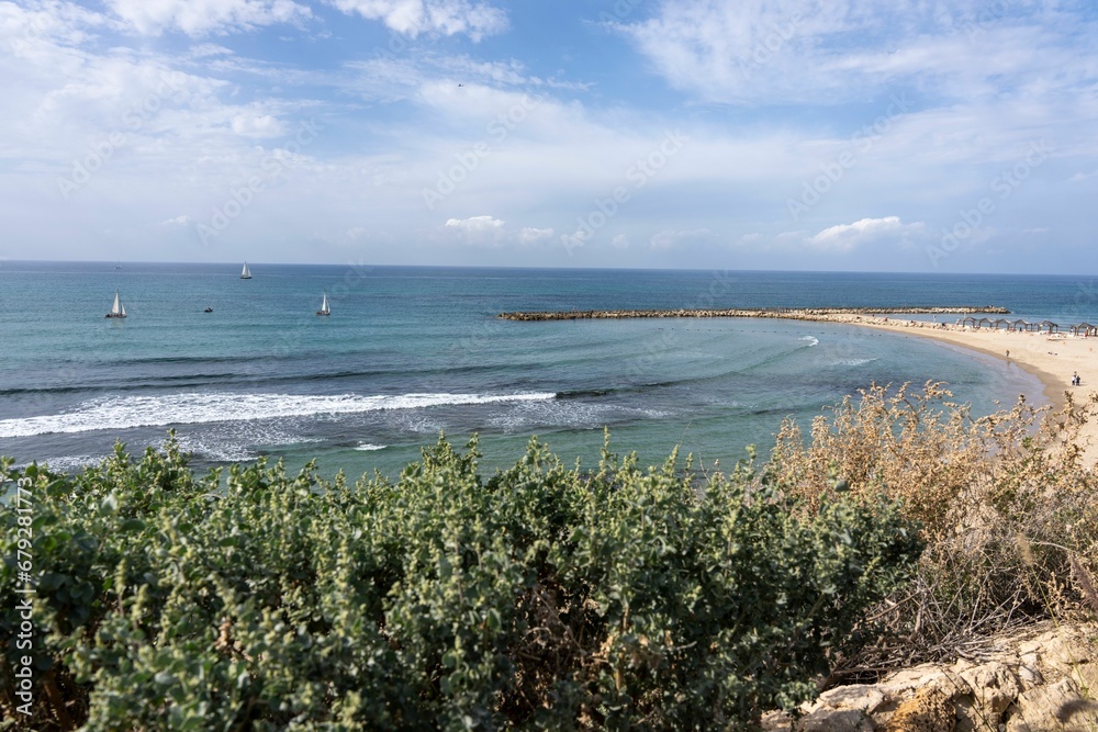 Picturesque view of the beach from a rocky outcrop in Tel Aviv, Israel