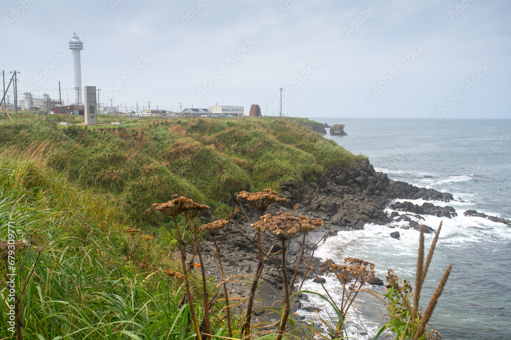 Cape Nosappu, the easternmost point in Hokkaido, and also in Japan, on Nemuro Peninsula, where the waters from Pacific Ocean meet Sea of Okhotsk, Nemuro, Hokkaido, Japan Cape Nosappu, the easternmost point in Hokkaido, and also in Japan, on Nemuro Peninsula, where the waters from Pacific Ocean meet Sea of Okhotsk, Nemuro, Hokkaido, Japan