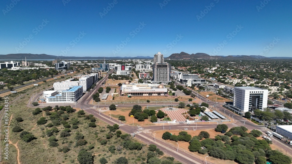 a bustling cityscape with lush vegetation alongside its streets, Gaborone, Botswana, Africa