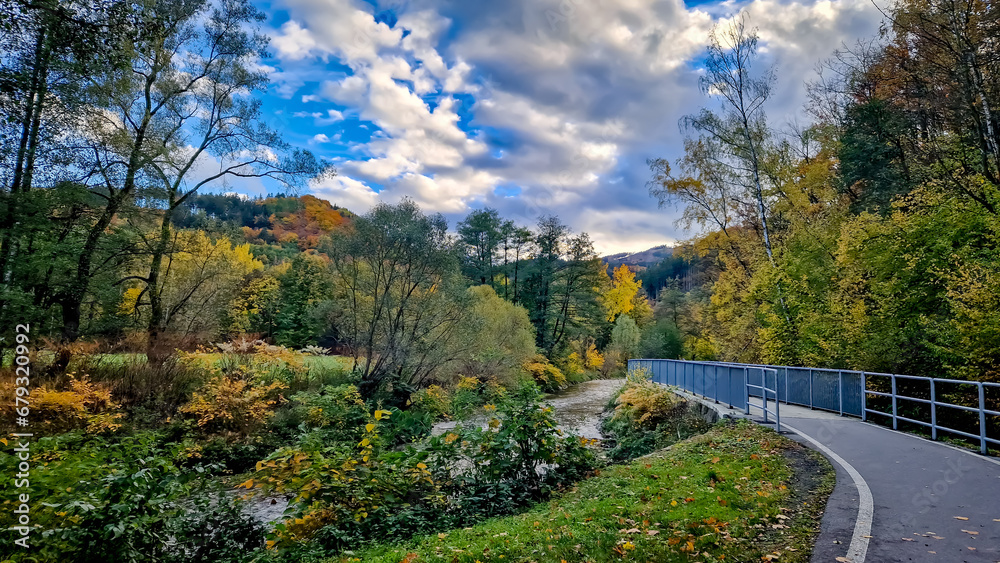 Walk around the Nisa river. Bicycle path Odra - Nisa between Chrastava and Bílý Kostel nad Nisou in autumn. Liberec region, Czech Republic. - obrazy, fototapety, plakaty 