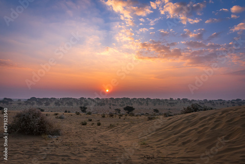 View during sunrise at great thar desert in Jaisalmer, Rajasthan, India. photo