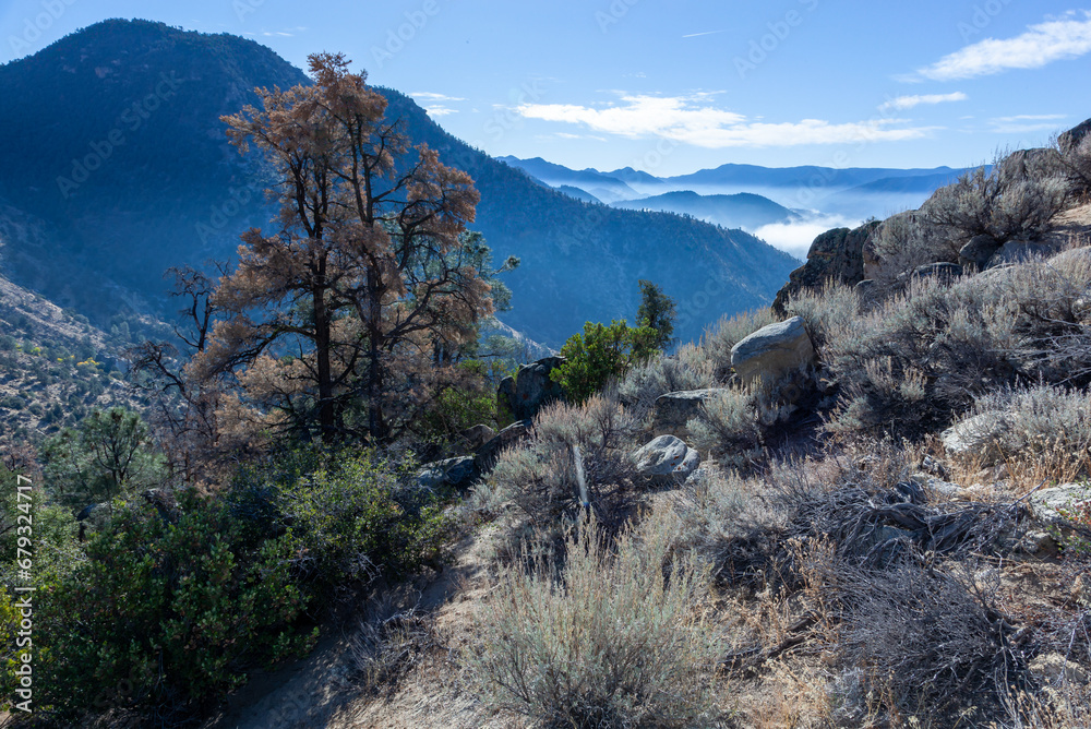 Clouds over valleys in the Sierra Nevada Mountains, California, USA Clouds over valleys in the Sierra Nevada Mountains, California, USA