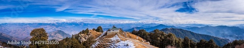 Beautiful panoramic landscape of Himalayan snow mountains from Hatu peak in Narkanda, Shimla district of Himachal Pradesh located amidst Himalayas of India. photo