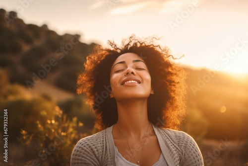 mixed race woman relaxing taking in the fresh air