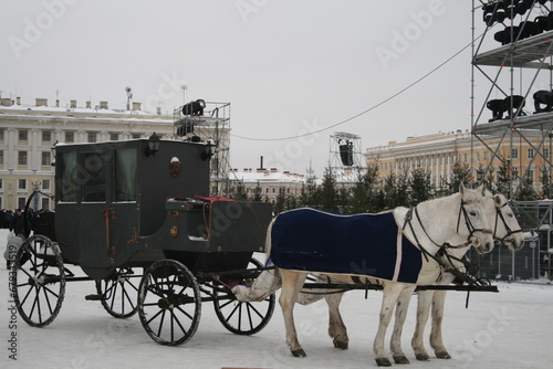 Carriage with horses. The Hermitage in St. Petersburg is a museum complex of world significance.