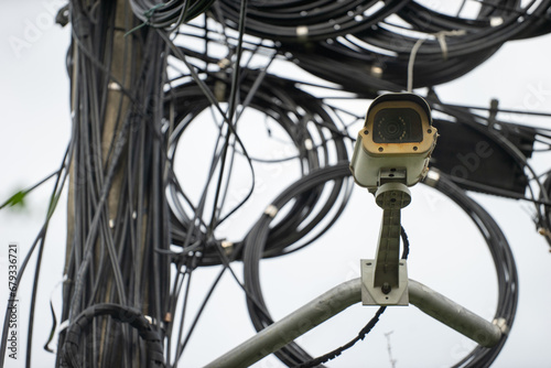 A stock photo of a CCTV (Closed Circuit Television) typically features an image or illustration related to surveillance, security, or monitoring systems. This type of image could include