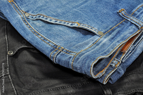 black jeans pants and blue jeans pants close-up